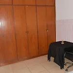 Quarto em residência tranquila e familiar