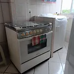 Quarto em apartamento em frente ao Riocentro e próximo a Jeunesse Arena e Vila Olímpica
