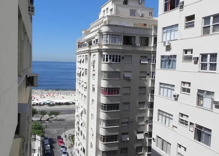 Colado Na Praia Com Mini Varanda.